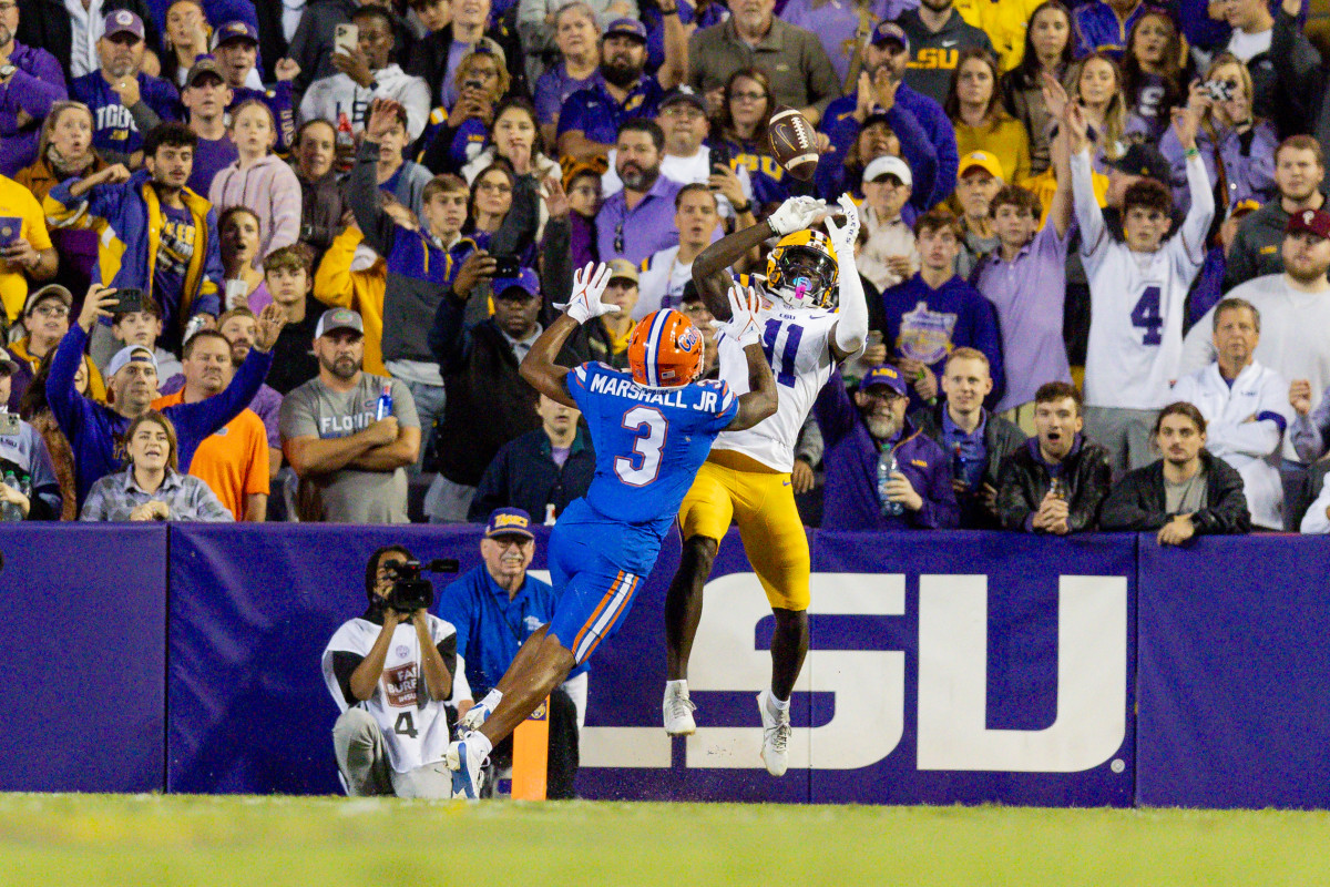 Florida Gators cornerback Jason Marshall Jr. (3) blocks the pass attempt to LSU Tigers wide receiver Brian Thomas Jr. (11) during the second half at Tiger Stadium.